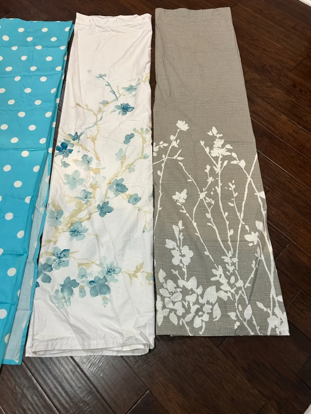 Bundle of three shower curtains
